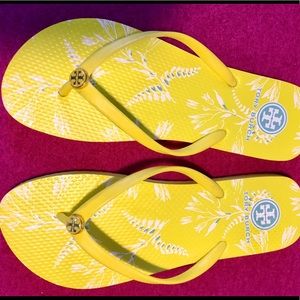 Yellow Tory Burch flip flops